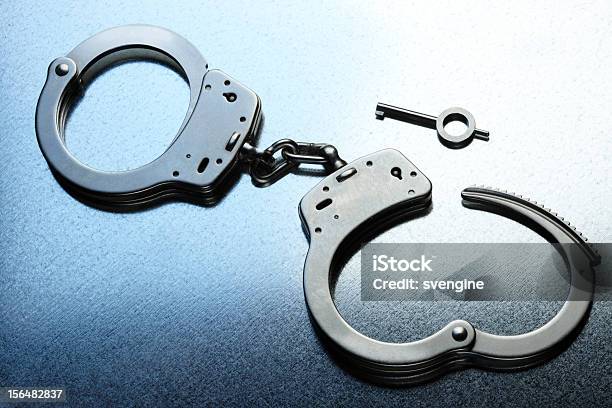 Handcuffs Unlocked Stock Photo - Download Image Now - Chain - Object, Criminal, Handcuffs