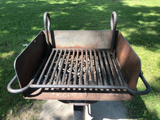istock Rusty park cooking grill on a stand 1564892458