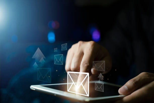 istock Hand of businessman using laptop computer , tablet, for email virtual screen. Business digital technology and marketing. 1564894587