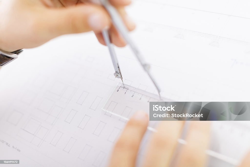 Project Male architect working with divider . Adult Stock Photo