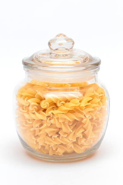 istock Uncooked Fusilli Pasta in Glass Jar 1564926840