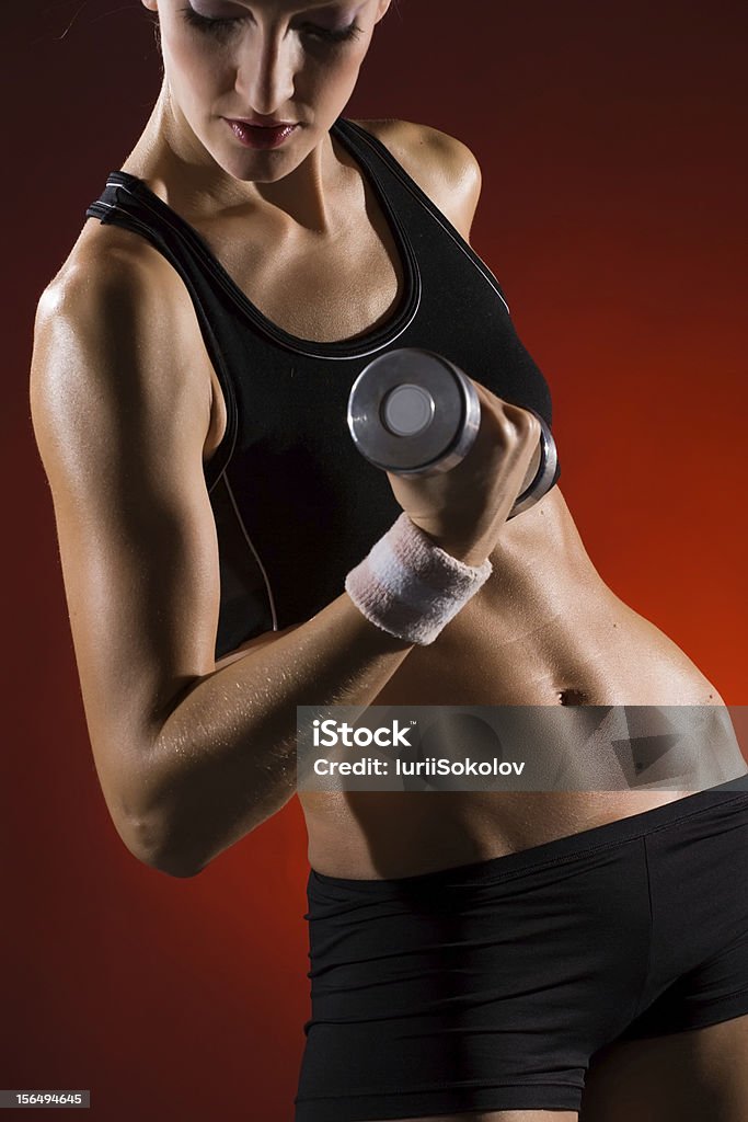 Красивая женщина тело в мышцах - Стоковые фото Атлет роялти-фри