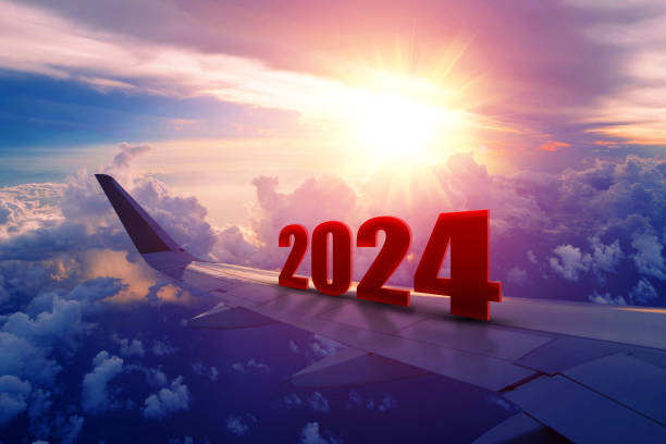 istock Airplane wing flying at sunrise in 2024 1564950277