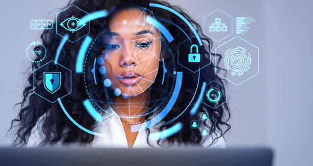 istock African businesswoman with laptop using facial recognition interface 1564957810