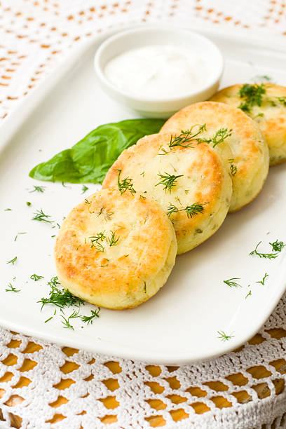 istock Salty cottage cheese cakes called syrniki with dill 156495994