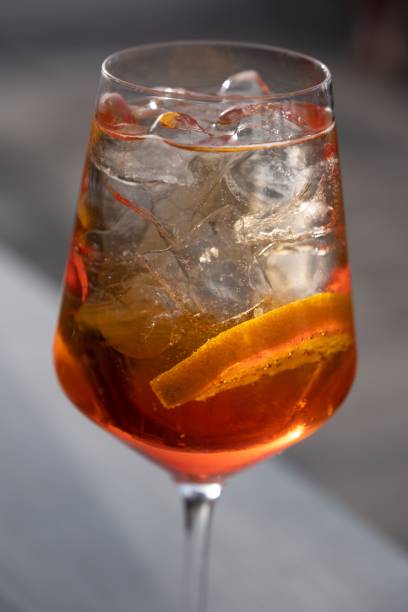 istock Crystal clear glass filled with a refreshing alcoholic beverage and icecubes 1564960008