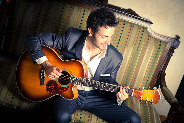 istock Young male guitar player 156501806