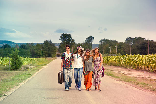 istock Hippie group walking on the road 156501817
