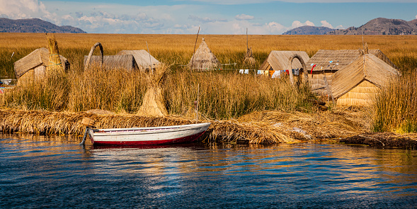 The floating reed islands of Los Uros on Lake Titicaca in the Puno region of Peru