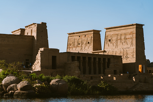 Ancient relief of Kom Ombo temple in Aswan Governorate, Upper Egypt. It was constructed during the Ptolemaic dynasty, 180-47 BC. Ra God, Hathor Goddess and Pharaoh