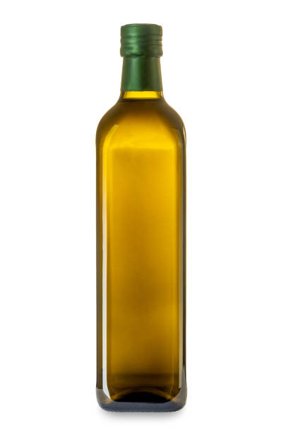 azeite virgem extra em garrafa de vidro verde isolada - cooking oil extra virgin olive oil olive oil bottle - fotografias e filmes do acervo