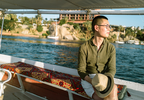 Tourist Taking Felucca Boat Ride in Aswan,Egypt