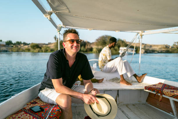 Tourist Taking Felucca Boat Ride in Aswan,Egypt