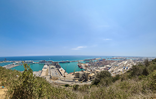 Aerial View of the industrial port of Barcelona on a sunny day