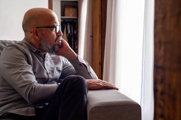 istock Middle aged man in loneliness, Depression and mental disorder. 1565083257