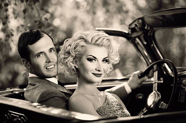 istock Retro couple in convertible 156508567