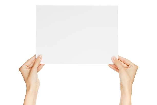istock Hands holding paper isolated on white 156508580