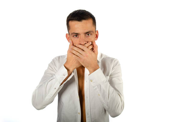 istock Young attractive businessman posing in the studio. 1565118015
