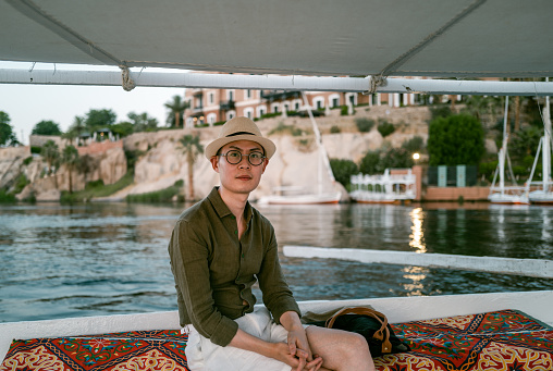 Tourist Taking Felucca Boat Ride in Aswan,Egypt