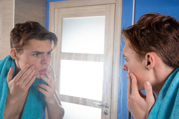 istock Early morning, young attractive guy in the bathroom. 1565130452