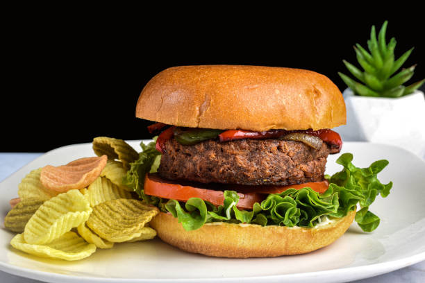 istock plant based  burger top with sauteed peppers and onions 1565166492