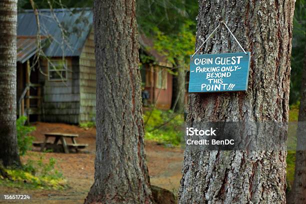 Cabin Guest Parking Only Sign Stock Photo - Download Image Now - Brown, Bush, Cottage