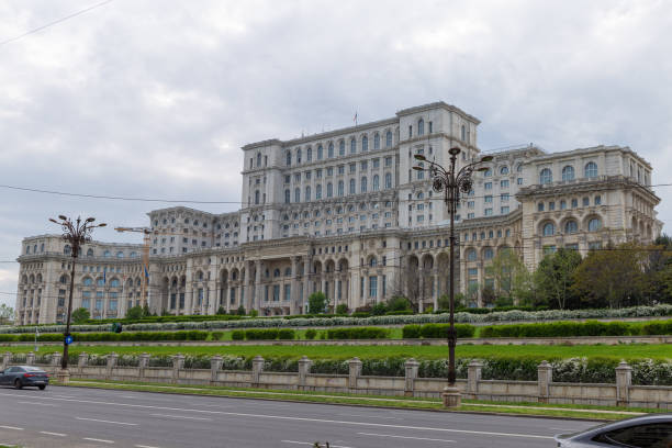 Bucharest Romania palace of parliament and street in front of building May 5, 2023 Bucharest Romania palace of parliament parliament palace in bucharest romania the largest building in europe stock pictures, royalty-free photos & images