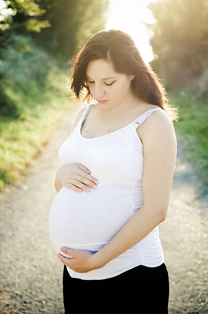 istock Beautiful pregnant woman 156521160