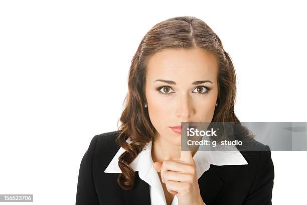 Poważny Biznes Kobieta Trzymając Palec Na Jej Usta - zdjęcia stockowe i więcej obrazów 20-29 lat - 20-29 lat, Białe tło, Biznes