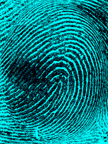 Index fingerprint with ultraviolet lamp as background, top view.