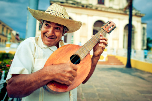 Senior man playing mandolin in Trinidad, Cuba