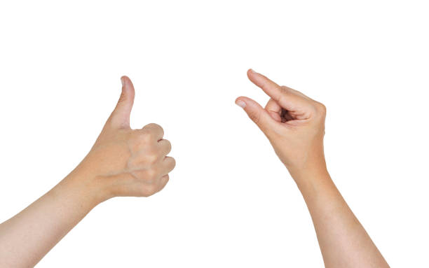 istock woman hand Thumb up and empty hand hold  isolated on white 1565353087