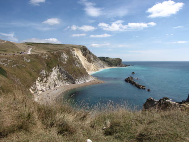 istock the jurassic coast with white cliffs and natural bays 1565373958