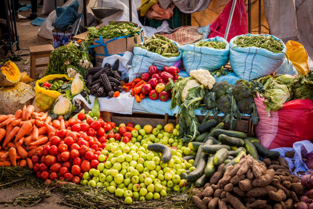 istock Colored fruit and vegetable sold at traditional Peruvian market, Puno, Peru 1565382470
