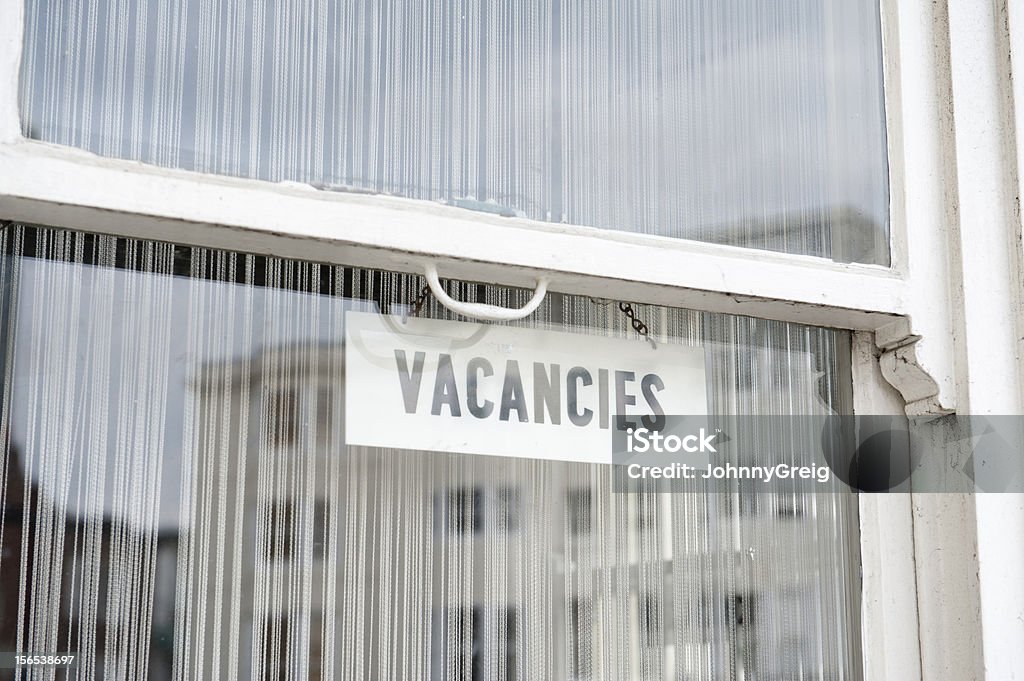 Vacancies Vacancies sign at a Brighton Bed and Breakfast window Hotel Stock Photo