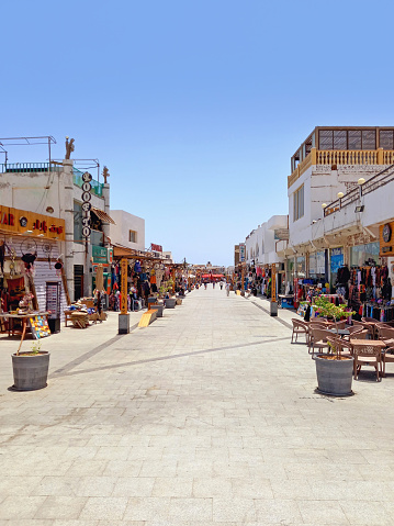 May 2023, Dahab, Egypt: View of Dahab pedestrian street in the Sinai desert. Commercial area of Egyptian coastal city. Arab culture and Red Sea.