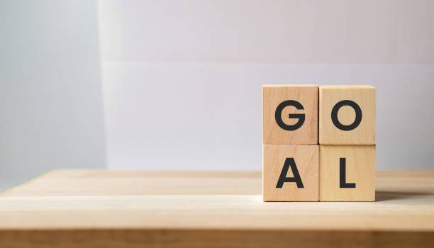 istock goal word written on wood cubes with white background 1565403337