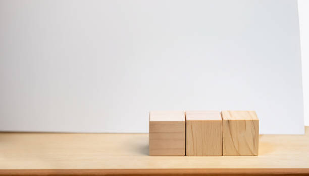 istock business concept on table side view wooden cubes 1565405475