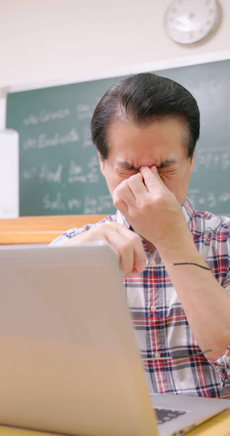istock male professor has eyes pain 1565407115