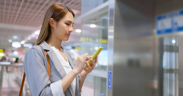istock woman wait lift at station 1565427433