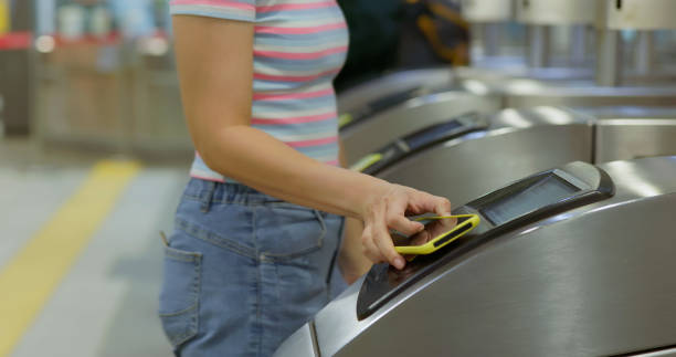 istock woman pass mrt speed gate 1565431258