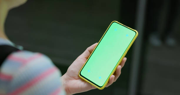 istock woman use phone at station 1565435086
