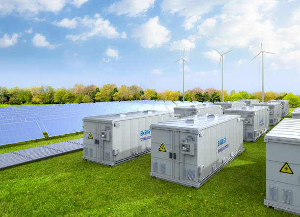 amount of energy storage systems or battery container units with solar and turbine farm - fuel and power generation wind turbine solar panel alternative energy imagens e fotografias de stock