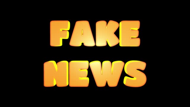 Bright inscription - fake news. 3D text animation on a black background.