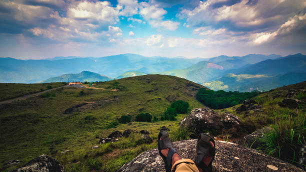 istock Wonderful blue cloud sky view in Ponmudi Kerela India 1565493893