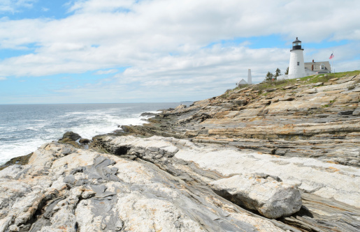 Pemaquid Point Lighthouse and coastal rock formations on the Atlantic Ocean