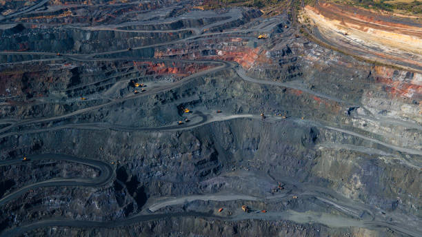 istock Huge iron ore quarry iron ore quarry top view Aero photo shoot. 1565497117