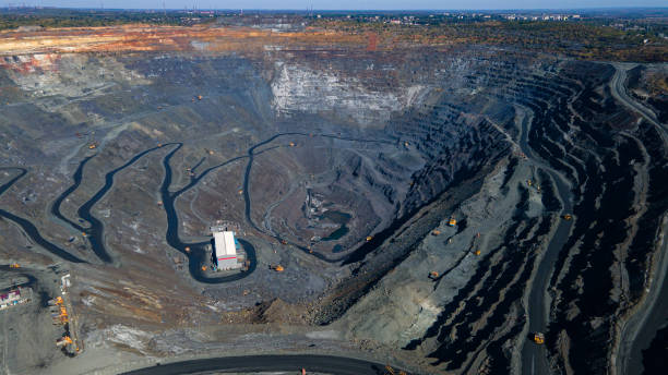 istock Huge iron ore quarry iron ore quarry top view Aero photo shoot. 1565497679