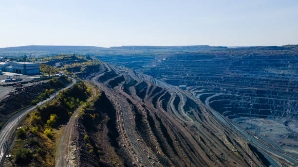 istock Huge iron ore quarry iron ore quarry top view Aero photo shoot. 1565517148