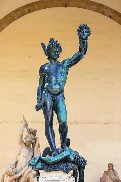 Statue of Perseus with the Head of Medusa. Florence, Italy. Film grain effect.